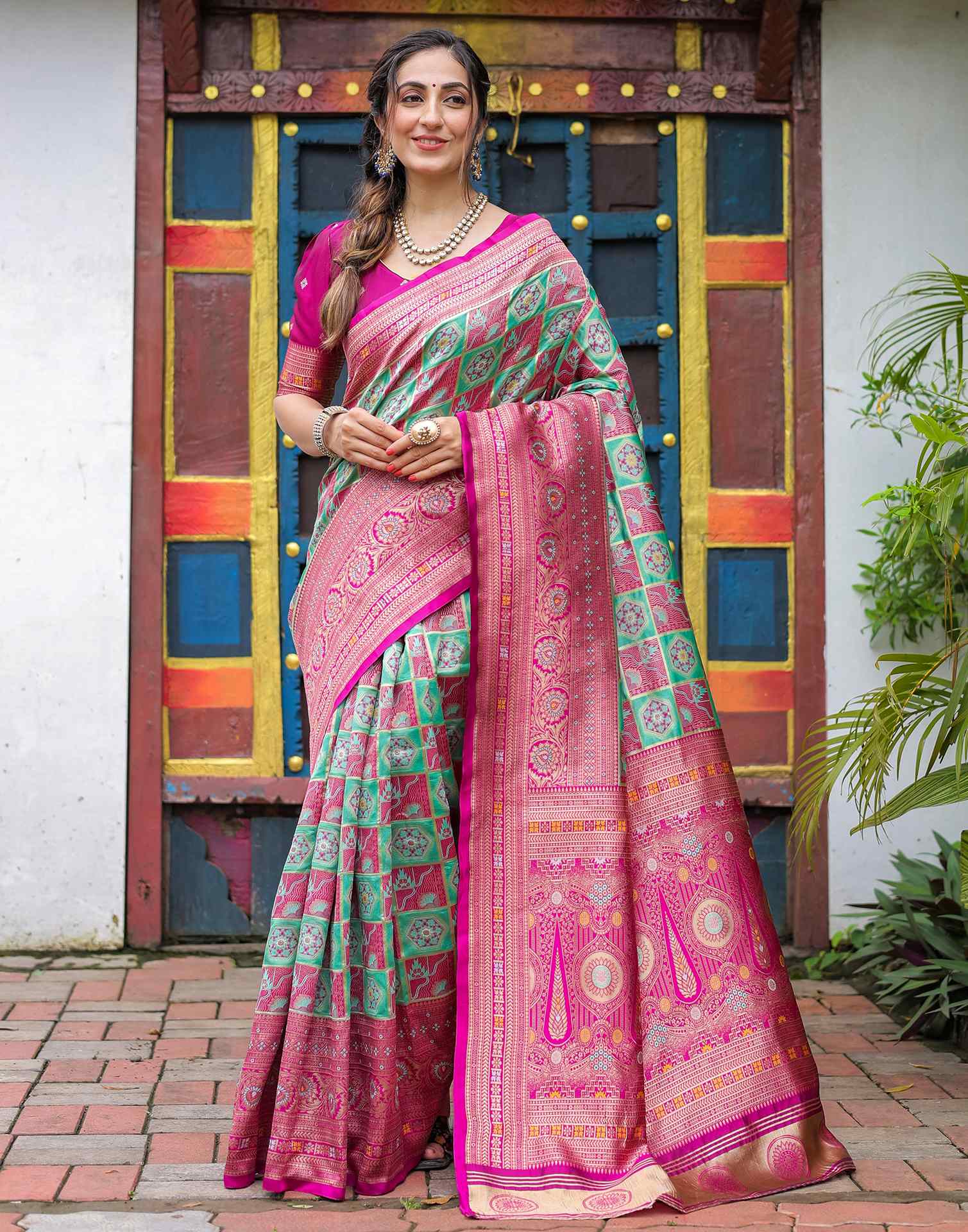 “Timeless Elegance: Vibrant Silk Saree Adorned with Floral & Geometric Embroidery”