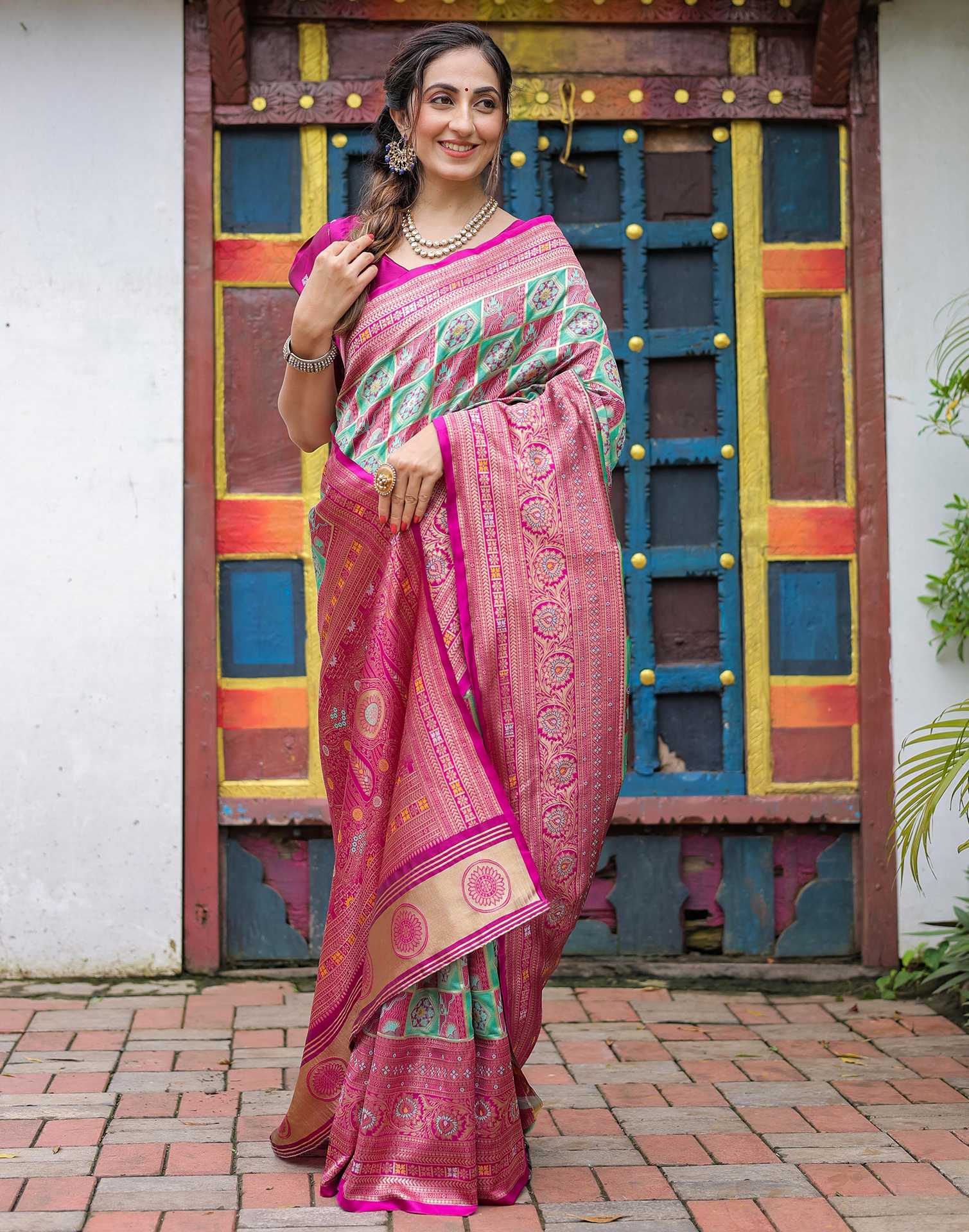 “Timeless Elegance: Vibrant Silk Saree Adorned with Floral & Geometric Embroidery”