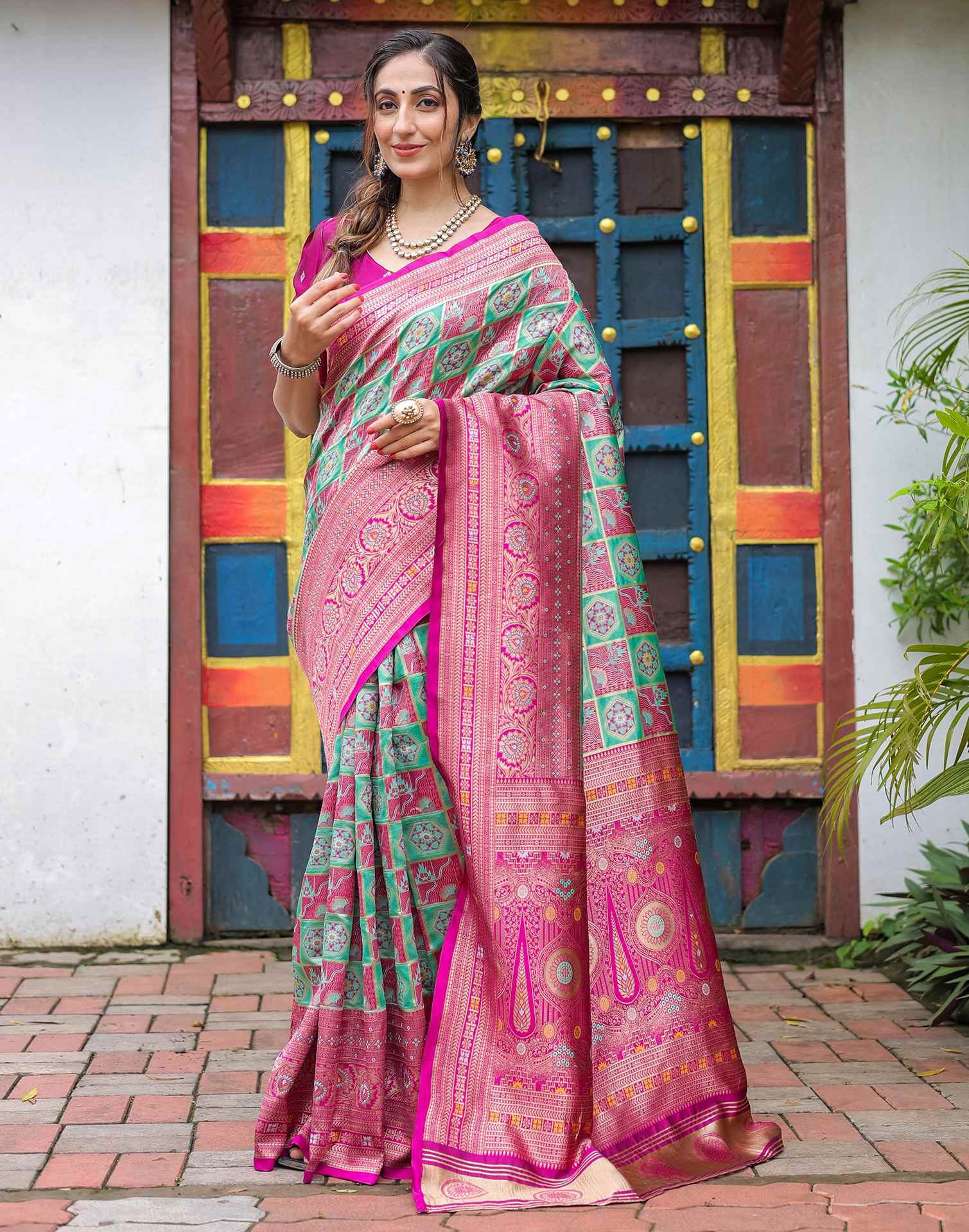 “Timeless Elegance: Vibrant Silk Saree Adorned with Floral & Geometric Embroidery”