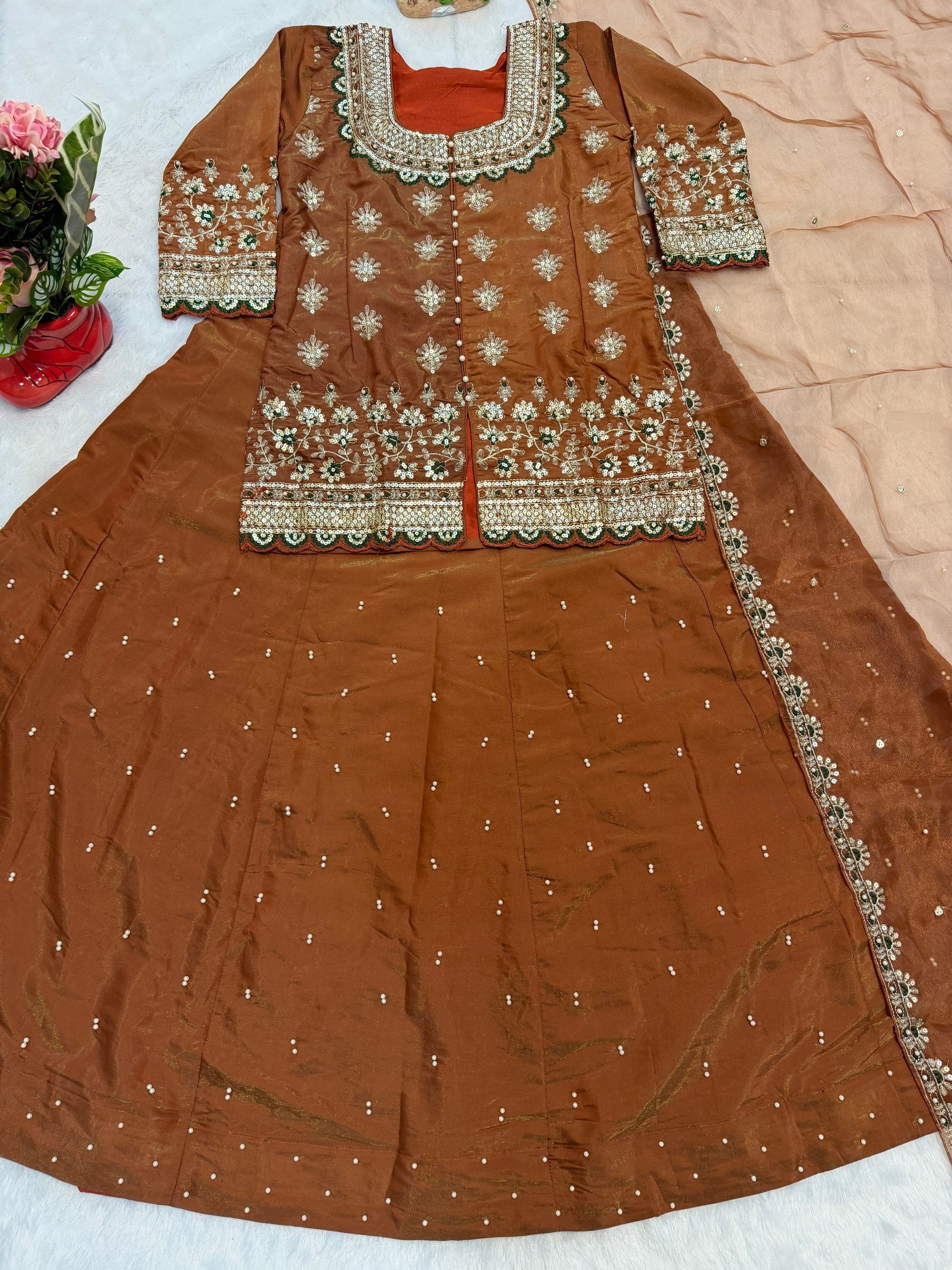 luxurious Simmer Silk embroidery and elegant moti work Lehenga Set