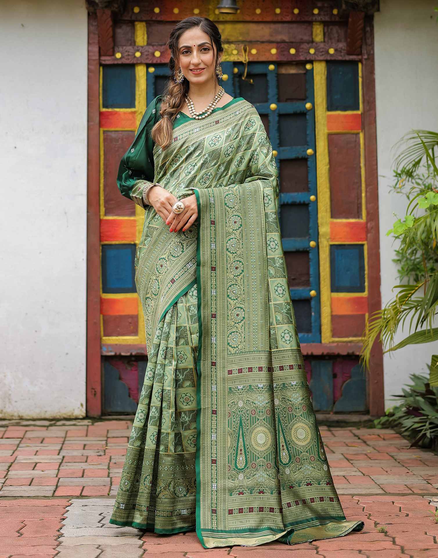 “Timeless Elegance: Vibrant  Silk Saree Adorned with Floral & Geometric Embroidery”