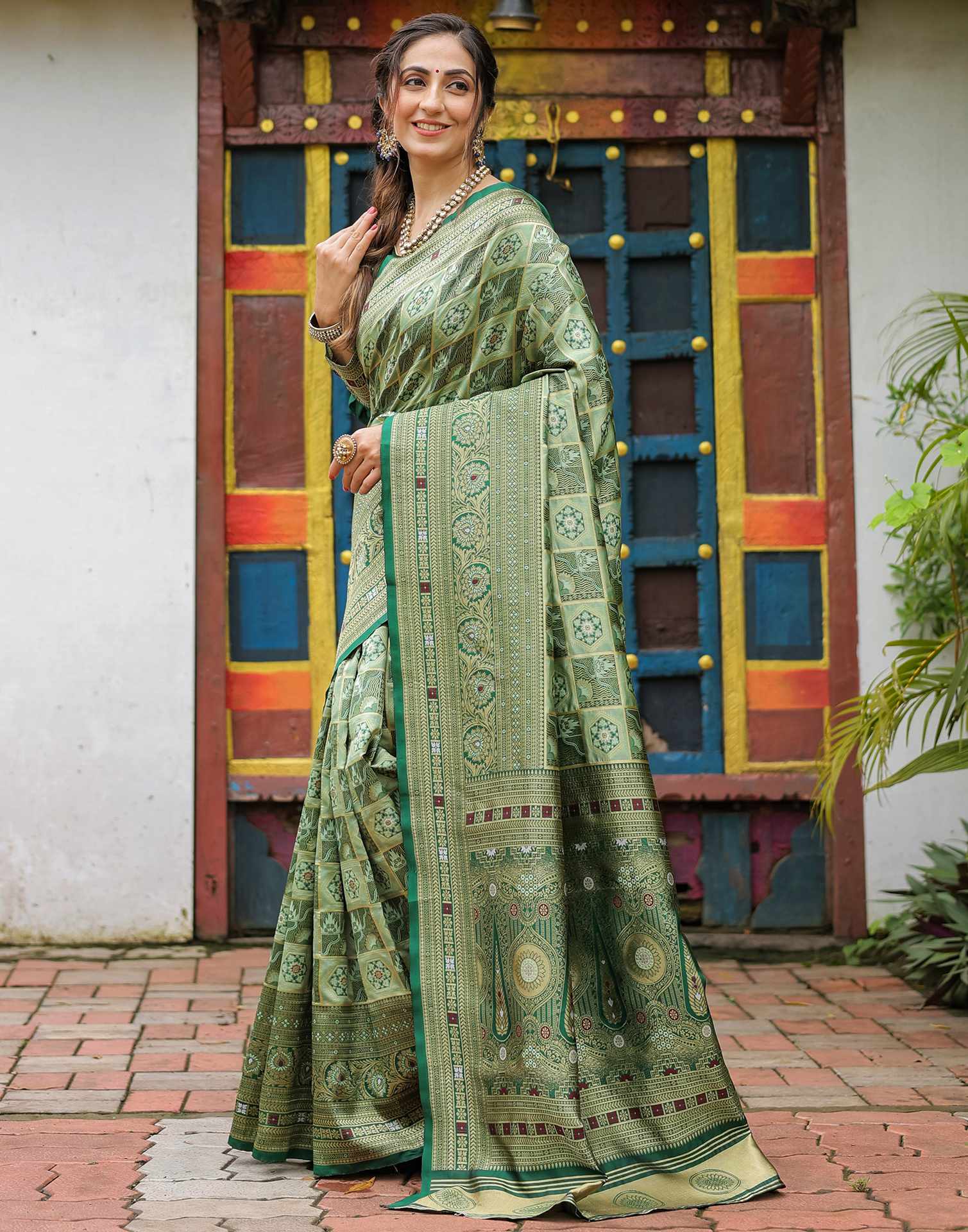 “Timeless Elegance: Vibrant  Silk Saree Adorned with Floral & Geometric Embroidery”