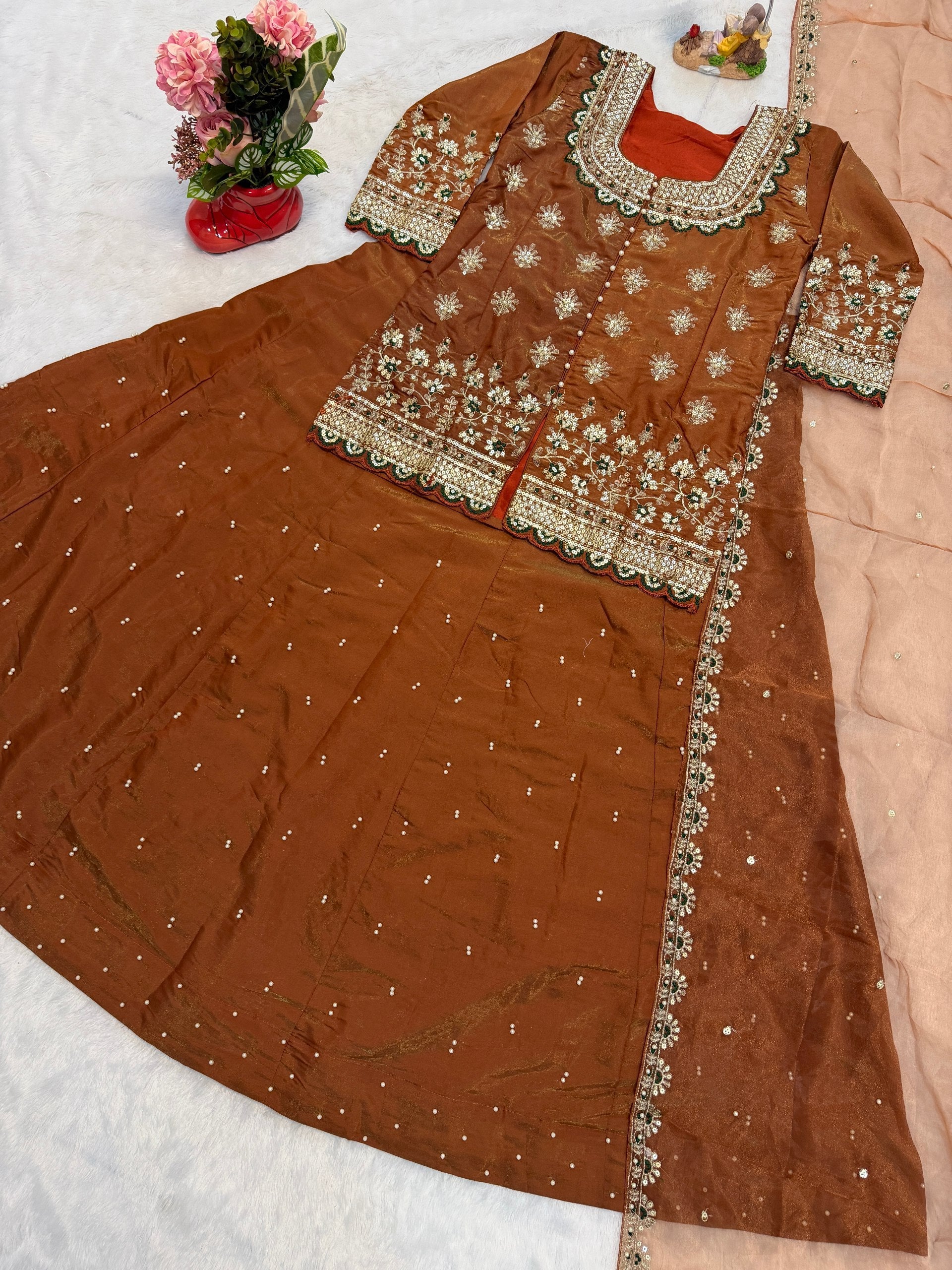 luxurious Simmer Silk embroidery and elegant moti work Lehenga Set