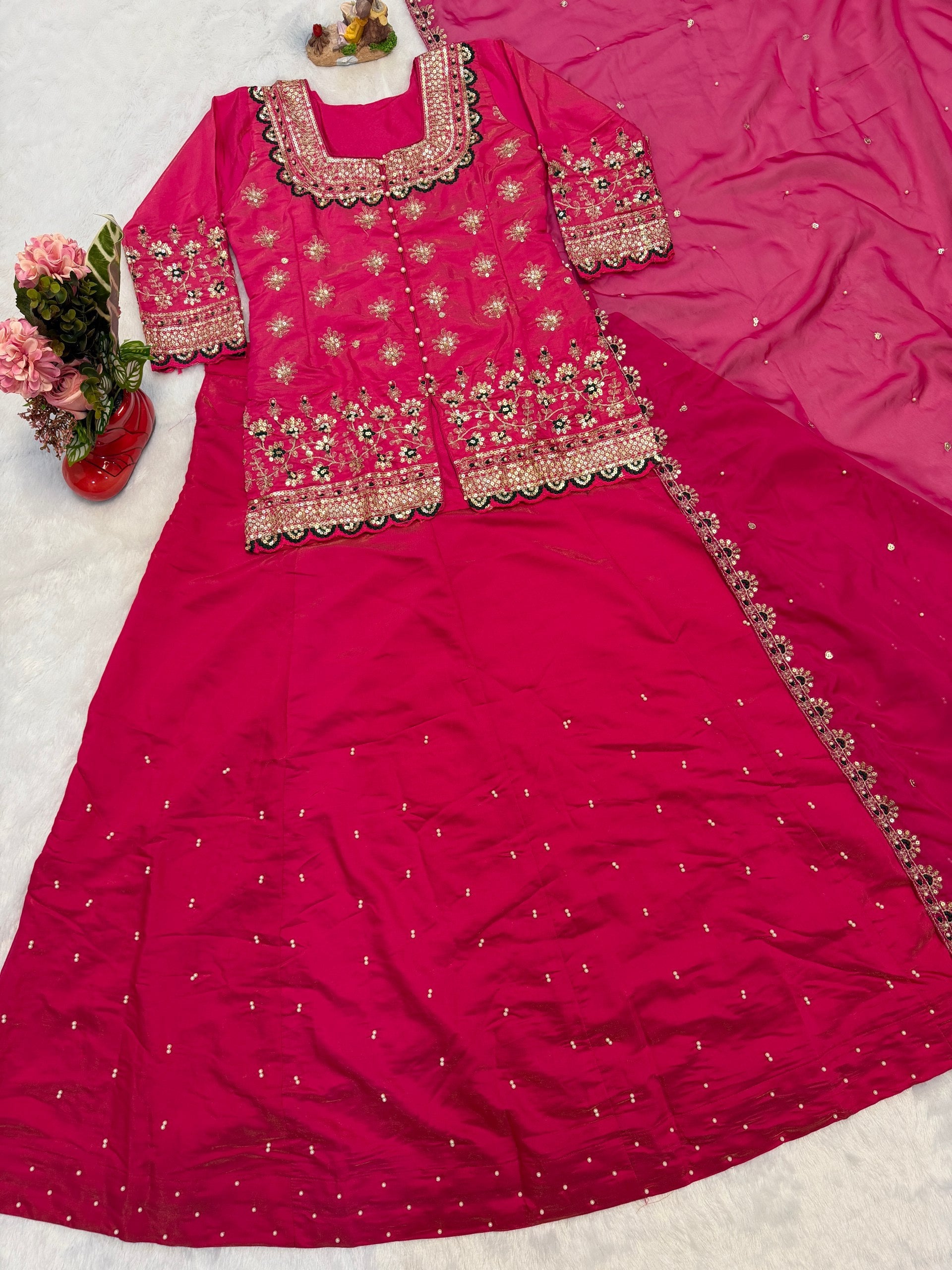 luxurious Simmer Silk embroidery and elegant moti work Lehenga Set